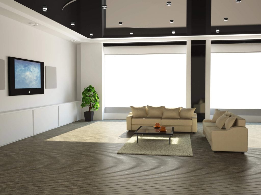 A Large Living Room With A TV And A Couch